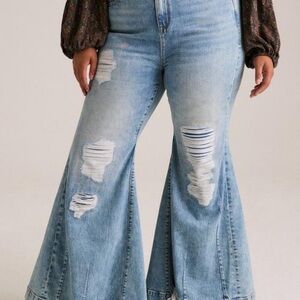 NWT Torrid Light Blue Distressed Flare Jeans